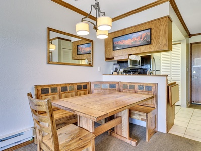 View Dining Room Banquette and Chandelier