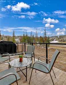 Outdoor seating area with views to the Navajo Lifts