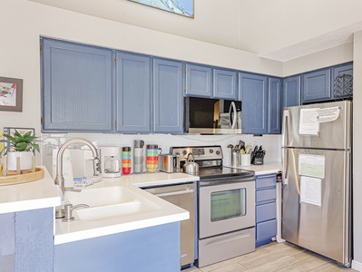 View of the fully loaded kitchen with updated appliances