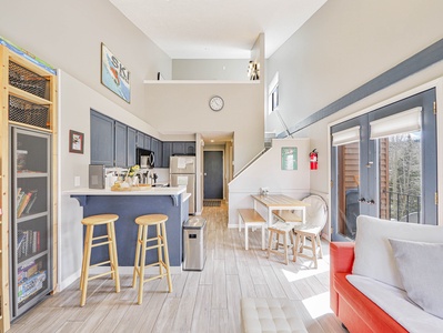 View from the living room to the open concept layout of Timberbrook Corner Loft