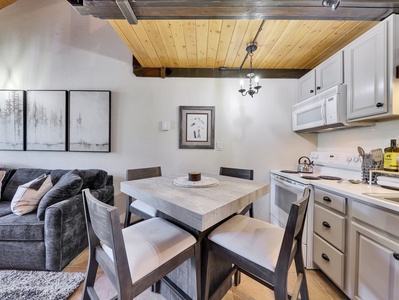 Dining Area with Seating for 4 and Kitchen Area