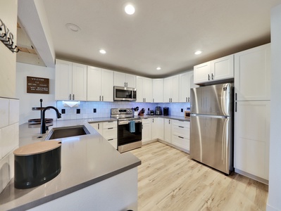 Newly remodeled kitchen featuring modern design and stainless steel appliances for all your cooking needs