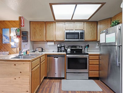 Fully loaded kitchen with stainless steel appliances