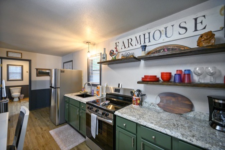 Enjoy the perfect blend of modern functionality and rustic charm in this well-equipped kitchen