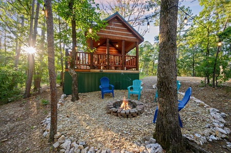 Idyllic log cabin feel with a fire pit that backs up to the national forest