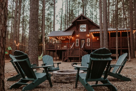 Comfortable Adirondack chairs with cupholders - a luxury! Enjoy the fire pit, grab the blankets, the s'mores, and your loved ones.