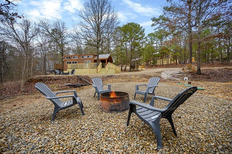 Firepit and adironak style chairs for those precious fireside chats.