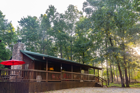 The front of the cabin features plenty of parking for multiple cars and/or recreational vehicles.