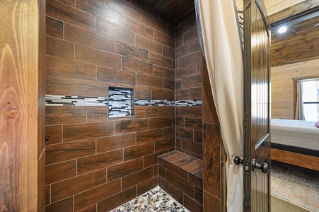 Each suite features a luxurious walk-in tile shower.