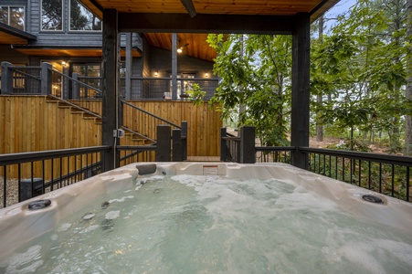 This private hot tub will rejuvenate while you kick back and enjoy the tall pines around you.