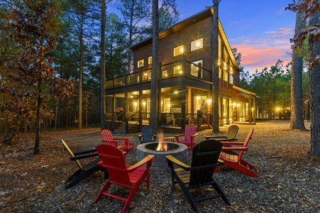 Firepit, back patio and back deck nestled amongst the trees