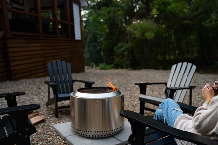 Enjoy the Solo Stove smokeless fire pit in the back, surrounded by pine and hardwood trees, and the Oklahoma sky!