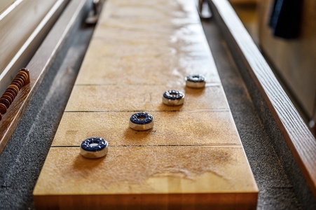 Shuffleboard game for guest enjoyment.