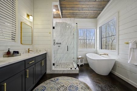 The master bath has a large soaker tub as well as a walkin shower.