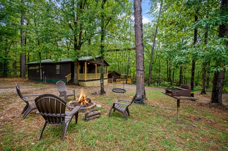 Nestled in the heart of the forest, this cozy cabin offers the perfect escape into nature and tranquility with the surrounding trees.