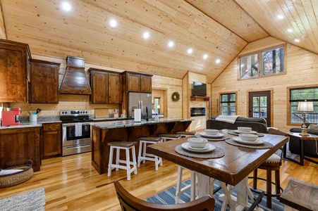 Open concept kitchen and dining area brings the family together.