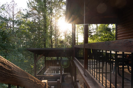 Enjoy the mountain lodge vibes dining from the top deck, or from the private hot tub on the second level.