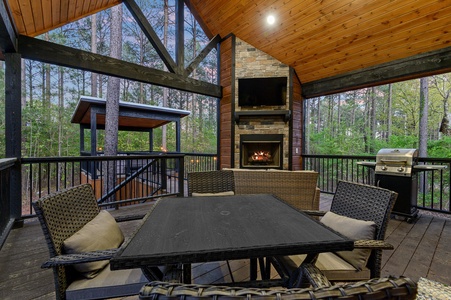 Plenty of outdoor dining space while the sun sets and the breeze blows through the fresh pine trees.