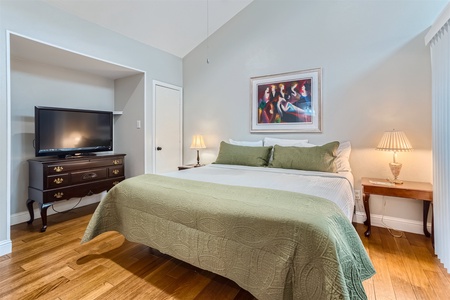 Master Bedroom with king size bed and smart tv