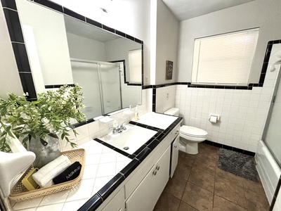 Bathroom 1 with sink and toilet