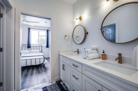 Guest bathroom with one full sized bed