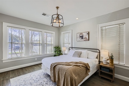 Master bedroom with king sized bed