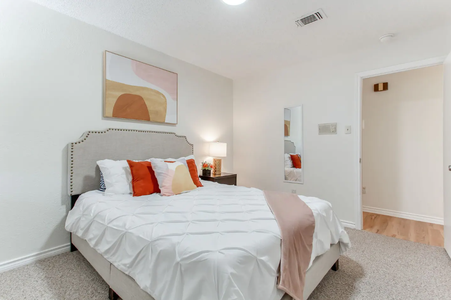 Guest Bedroom  with closet and  queen size bed