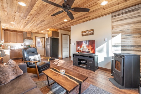 Living room with TV and ceiling fan
