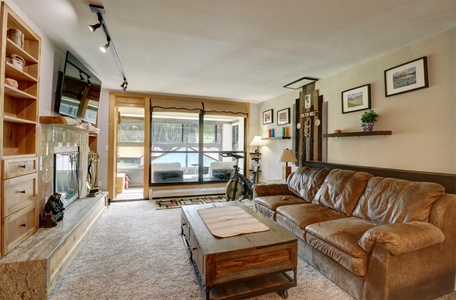 Cozy living room with queen sleeper sofa.