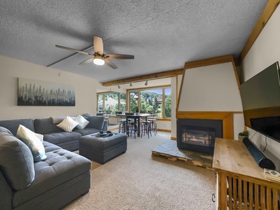 Living area features fireplace