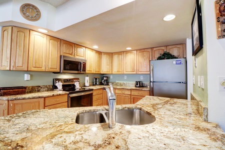 Modern kitchen featuring nicely updated appliances