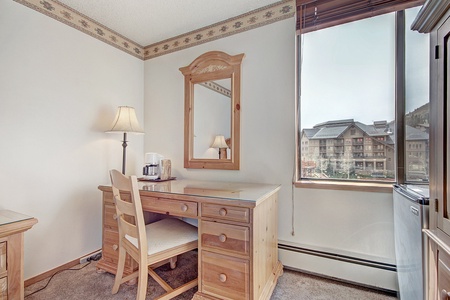 Desk vanity area looking out to West Lake and Center Village at Copper Mountain.