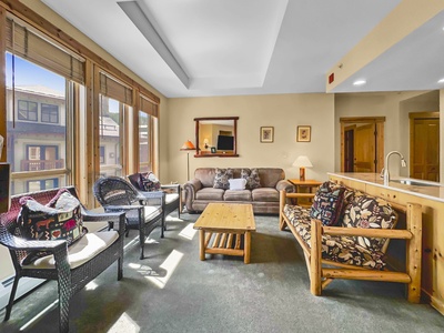 Living room features a couch that pulls out into a queen sleeper sofa.