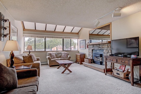 Open concept living area with fireplace