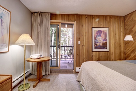 Looking out onto private deck from bedroom.