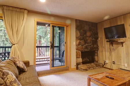 Nicely updated decks offer great wooded views, located right off the main living area.