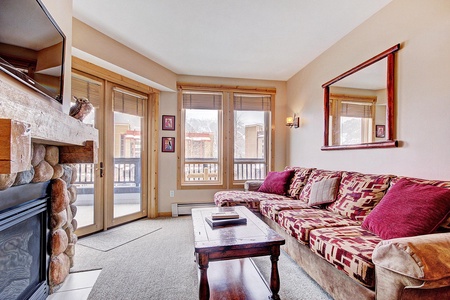 Cozy living room with a queen sleeper sofa.