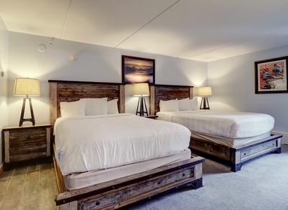 Hotel room offers 2 queen beds.