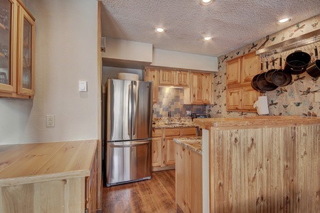 The kitchen features nice stainless steel appliances.