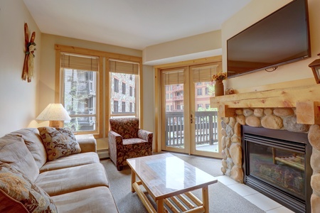 Cozy living room area with private balcony