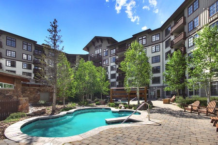 Passage Point has multiple outdoor hot tubs in the backyard area.