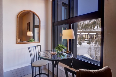 Nice seating area with table, overlooking West Lake.