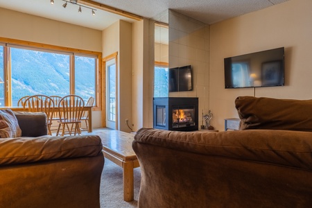 Cozy living room with fireplace.