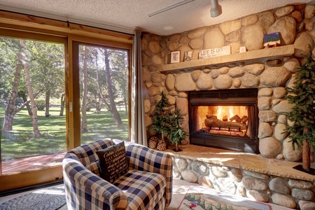 Fireplace is nice for cozying up next to with great views outside