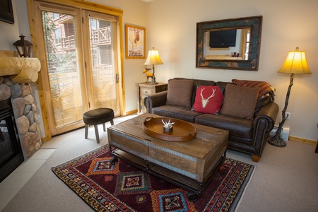 Living room features a queen sleeper sofa