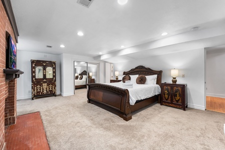 Unwind in the primary bedroom's king bed with a TV, two closets, and a private ensuite.