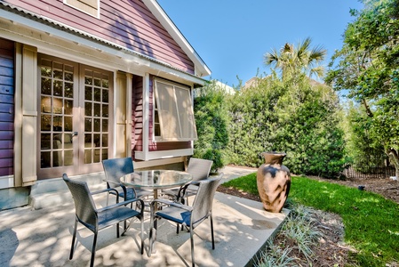 back patio sitting area with bbq grill