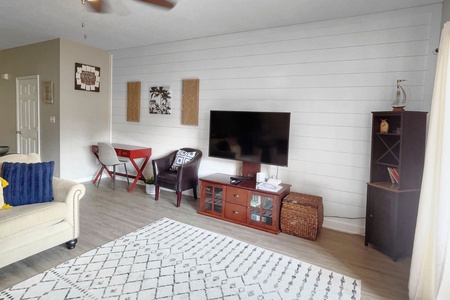 Living room with flatscreen television.