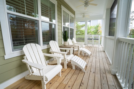 Adirondack chairs on the screened-in back porch.
