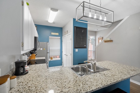 Kitchen with stainless steel appliances.